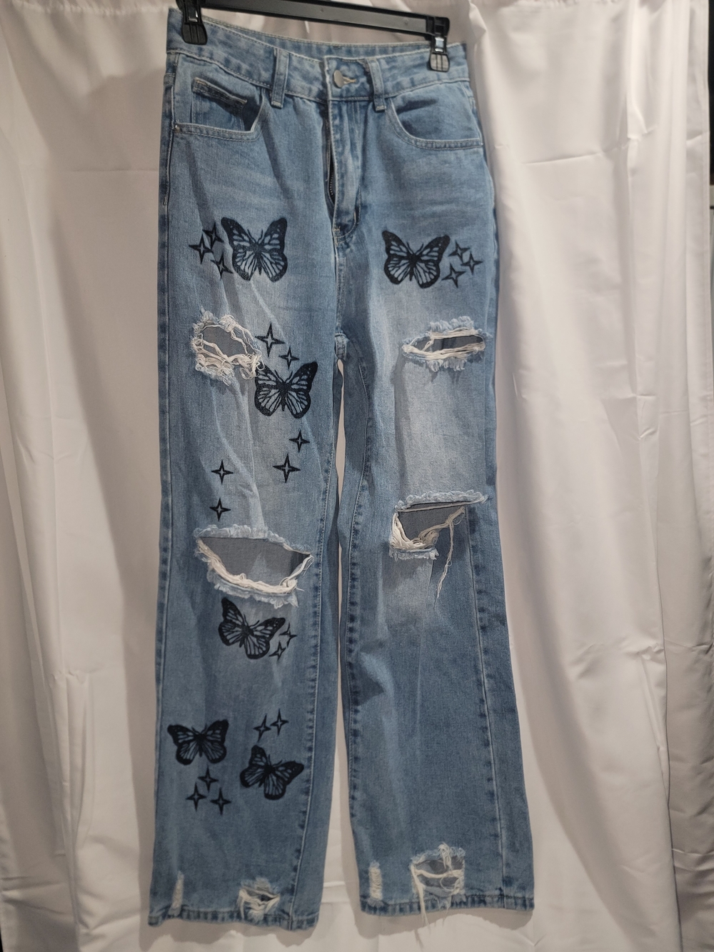 SHEIN Light Blue Distressed Wide Leg Jeans with Black Butterfly Design